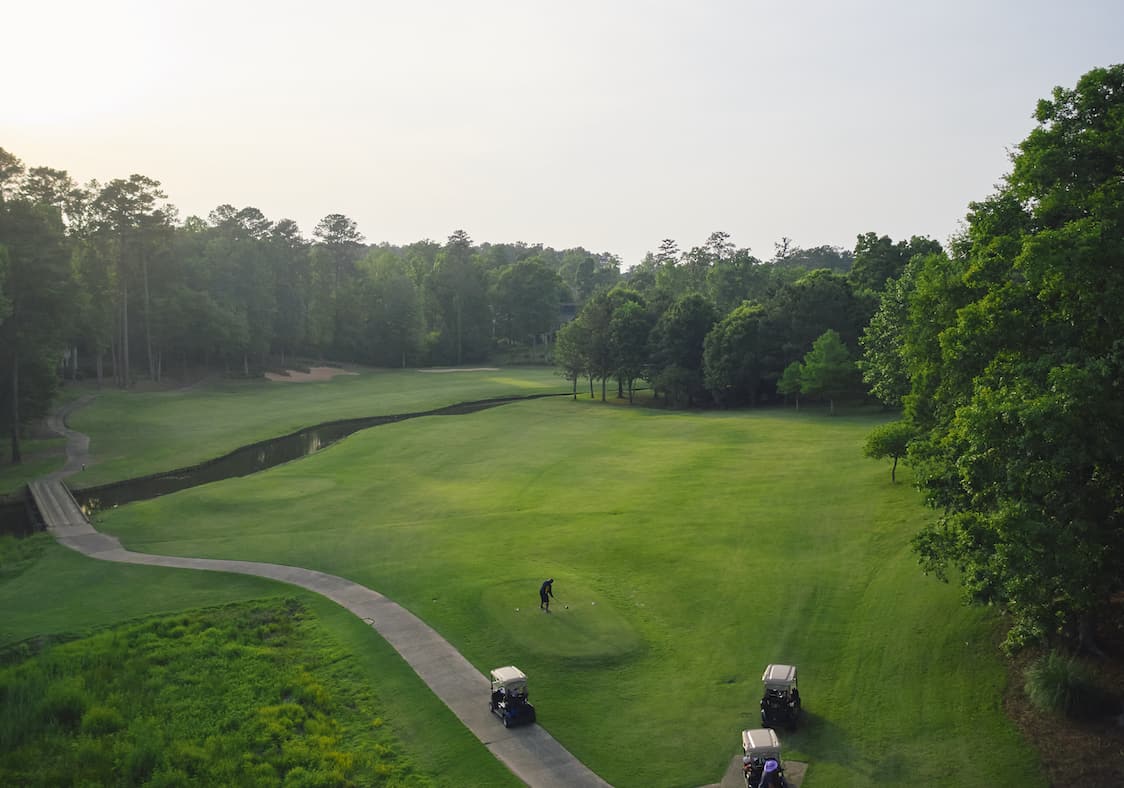 people on golf course